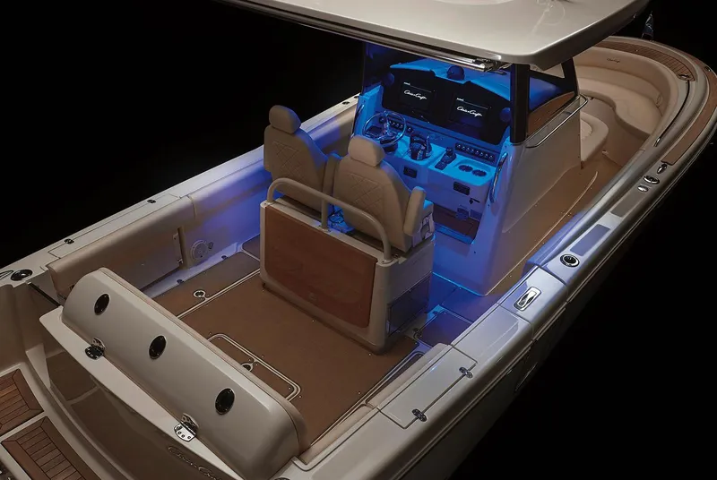 Slide: The Image of Luxurious seating on 2023 Chris-Craft Catalina 30 boat, featuring elegant quilted upholstery. - 17