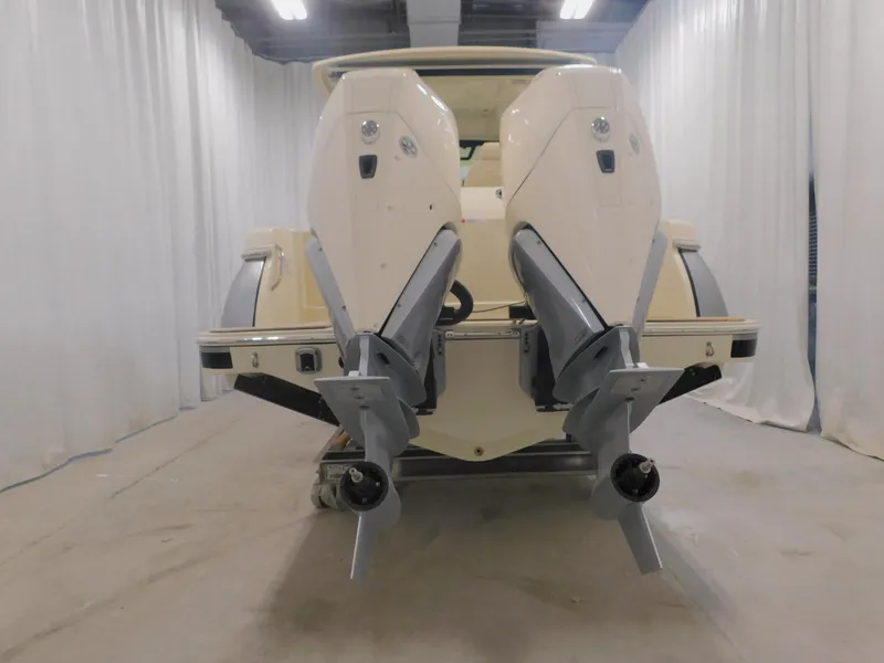 Slide: The Image of 2023 Chris-Craft Catalina 30 boat in showroom with Mercury engines. - 3