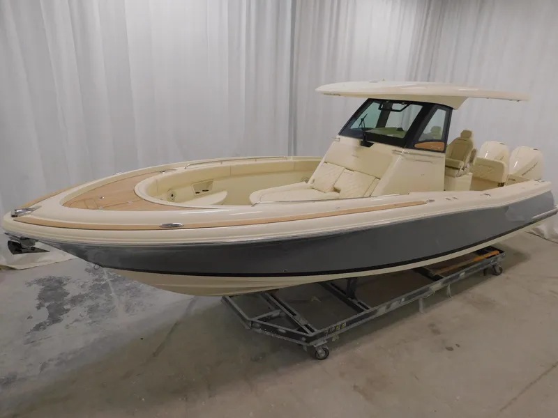 Slide: The Image of 2023 Chris-Craft Catalina 30 interior with elegant seating and ambient lighting. - 9