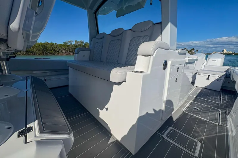 Slide: The Image of Luxurious interior of 2024 HCB 53 Sueños boat with plush seating and sleek design. - 45
