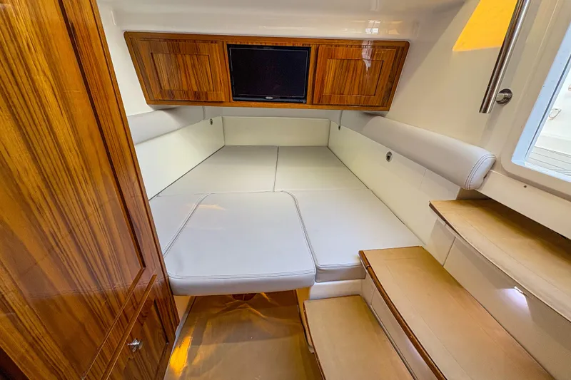 Slide: The Image of Luxurious interior cabin of 2024 HCB 53 Sueños with wood accents and comfortable seating. - 23