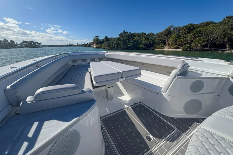 Slide: The Image of Luxurious seating area on 2024 HCB 53 Sueños boat, with scenic water view. - 37