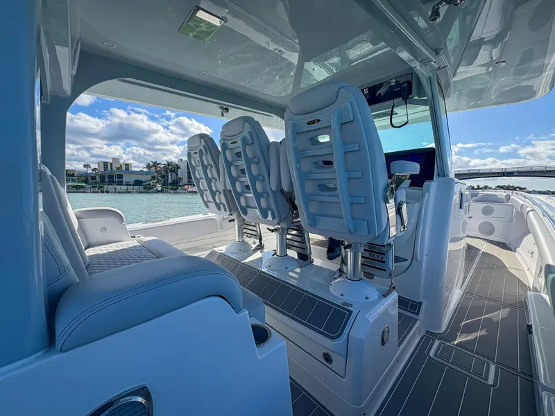 Slide: The Image of 2024 HCB 53' Suenos boat interior with luxurious seating and modern design. - 42