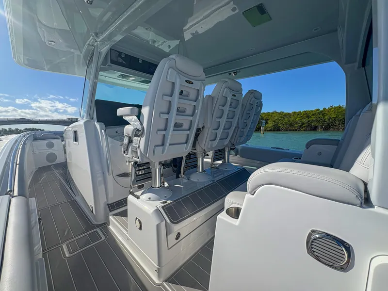 Slide: The Image of 2024 HCB 53' Suenos boat interior with luxurious seating and sleek design. - 43