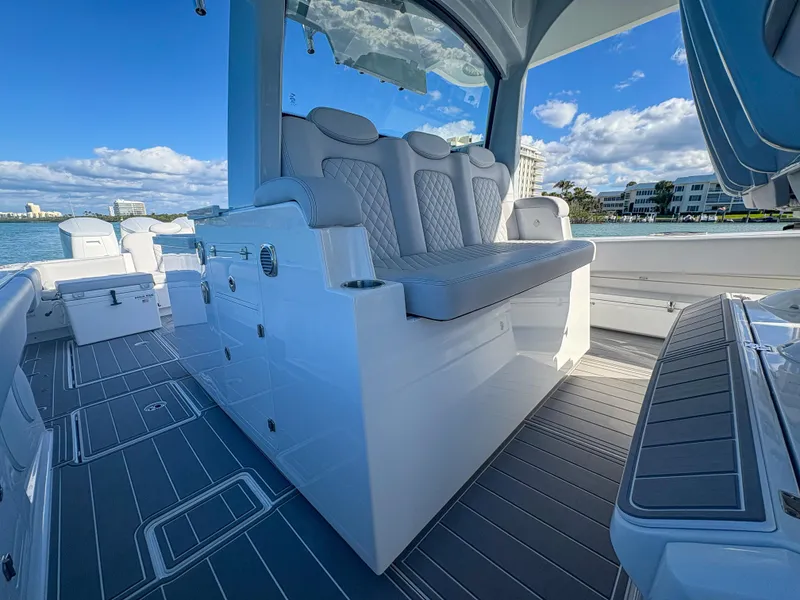 Slide: The Image of 2024 HCB 53' Suenos luxury boat interior with plush seating and modern design. - 45