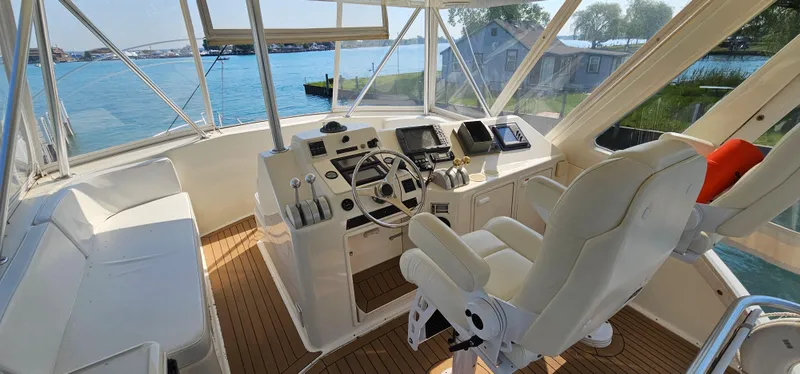 Slide: The Image of 1997 Ocean Yachts 48 Super Sport helm with panoramic view. - 12