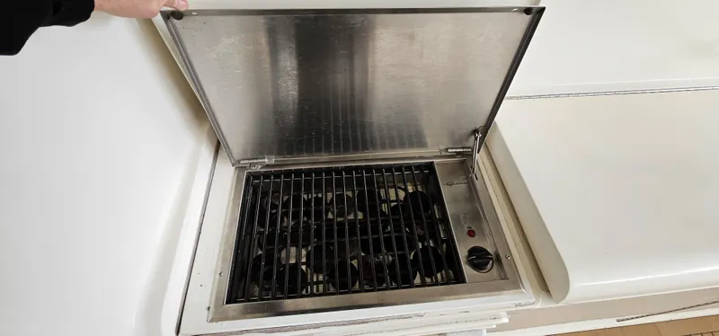 Slide: The Image of Grill on a 1997 Ocean Yachts 48 Super Sport. - 11