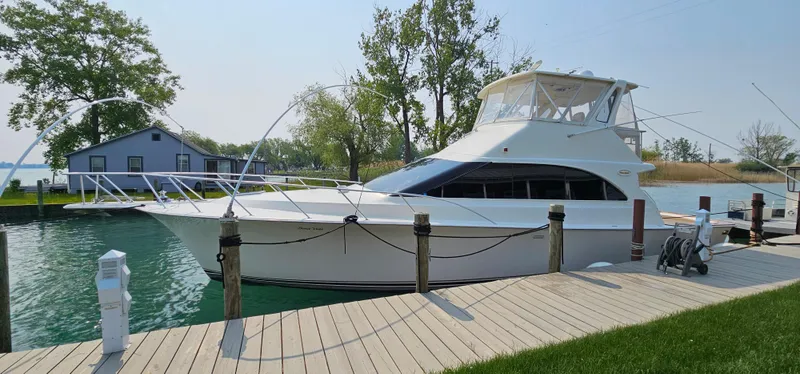 Slide: The Image of 1997 Ocean Yachts 48 Super Sport docked on a sunny day. - 3