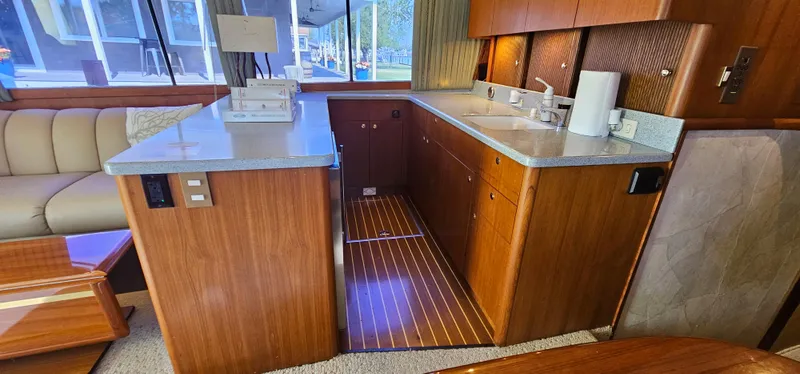 Slide: The Image of Interior view of Ocean Yachts 48 Super Sport 1997 kitchen. - 33