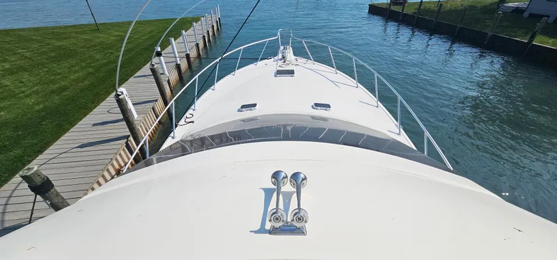 Slide: The Image of 1997 Ocean Yachts 48 Super Sport at dock, top view. - 48