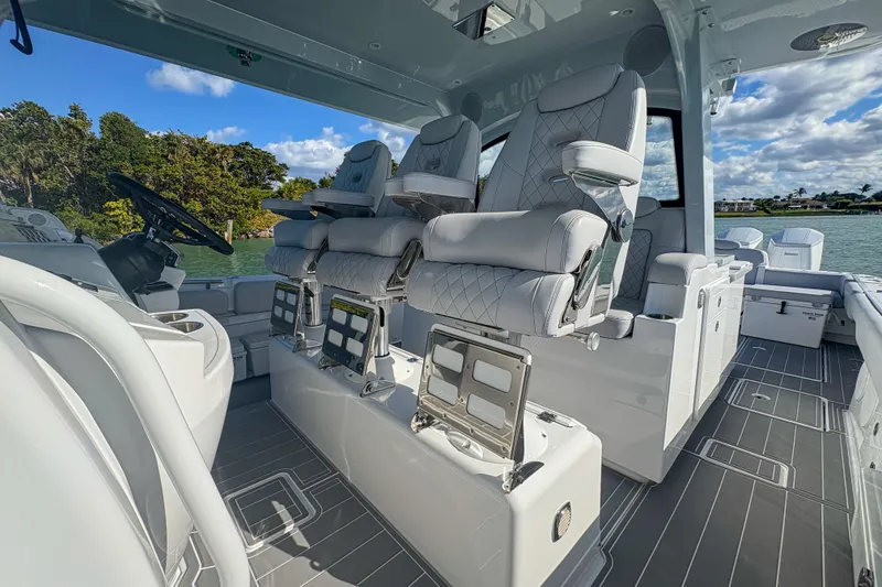 Slide: The Image of Luxurious interior of 2024 HCB 53' Suenos boat with plush seating and modern design. - 27