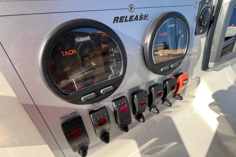 Slide: The Image of Control panel of 2015 Release 190RX boat with Yamaha tachometer and switches. - 10