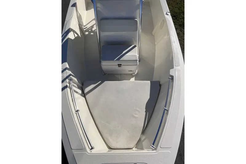Slide: The Image of 2015 Release 190RX boat interior with seating and storage area. - 21
