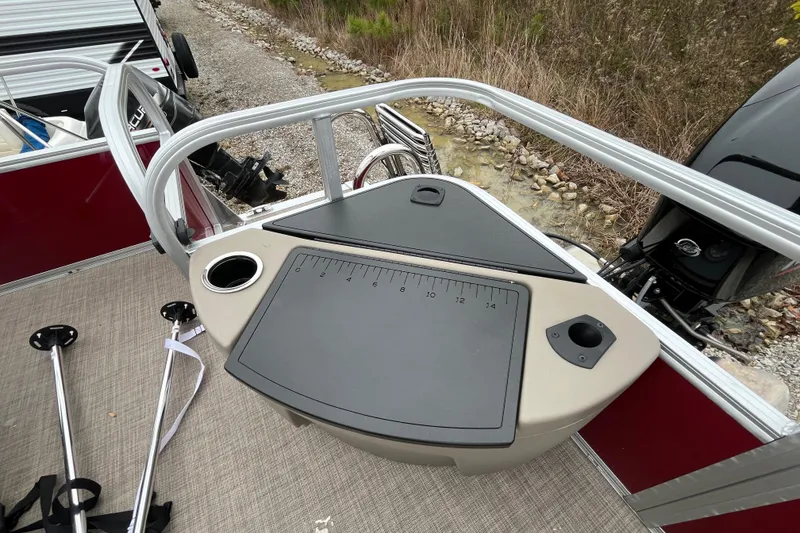Slide: The Image of 2025 Sun Tracker Bass Buggy 18 DLX pontoon boat with fishing station and motor. - 15