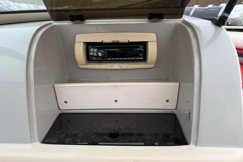 Slide: The Image of 1995 Donzi 212 Medallion boat dashboard with Alpine stereo system. - 13