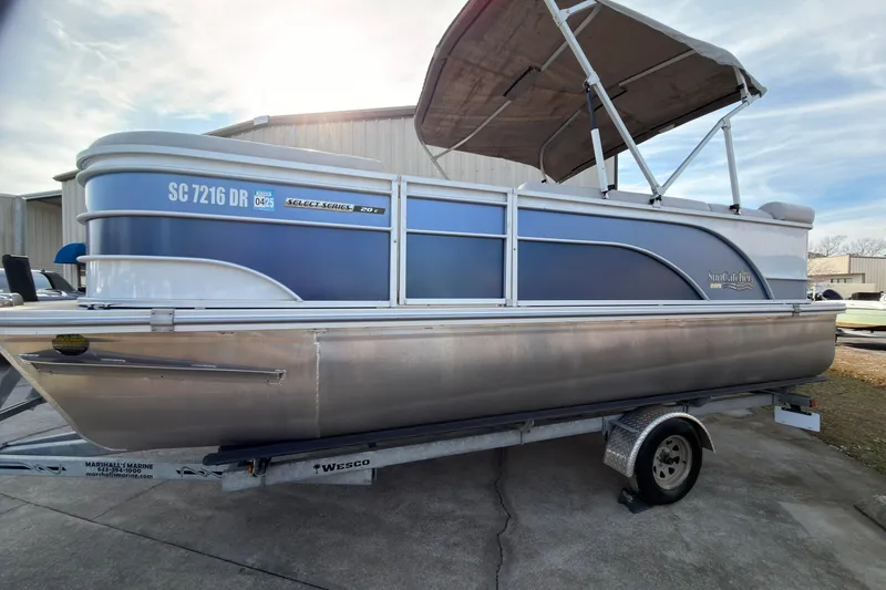 Slide: The Image of 2021 SunCatcher Select 20C pontoon boat on trailer, blue and silver design. - 5