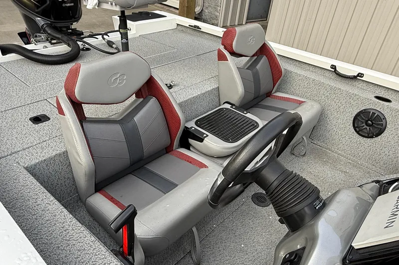 Slide: The Image of 2021 G3 Sportsman 1810 boat interior with dual seats and steering wheel. - 4