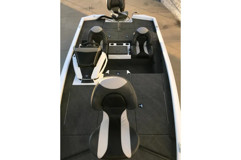 Slide: The Image of 2022 Vexus AVX1880 boat interior with black and gray seating, modern design. - 3