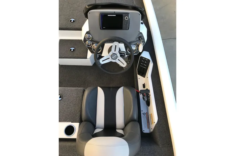 Slide: The Image of 2022 Vexus AVX1880 boat cockpit with steering wheel and control panel. - 4