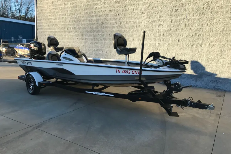 Slide: The Image of 2022 Vexus AVX1880 boat on trailer, parked outdoors, side view. - 6