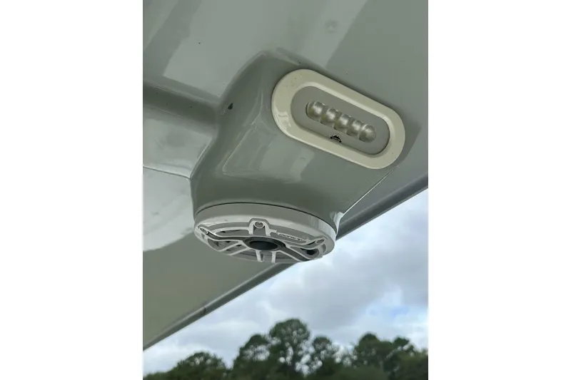 Slide: The Image of 2022 BlackJack 256 Bay boat speaker and light detail under canopy. - 10
