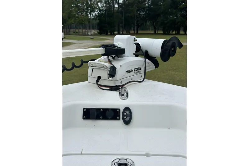 Slide: The Image of Minn Kota Terrova motor on 2022 BlackJack 256 Bay boat deck. - 11