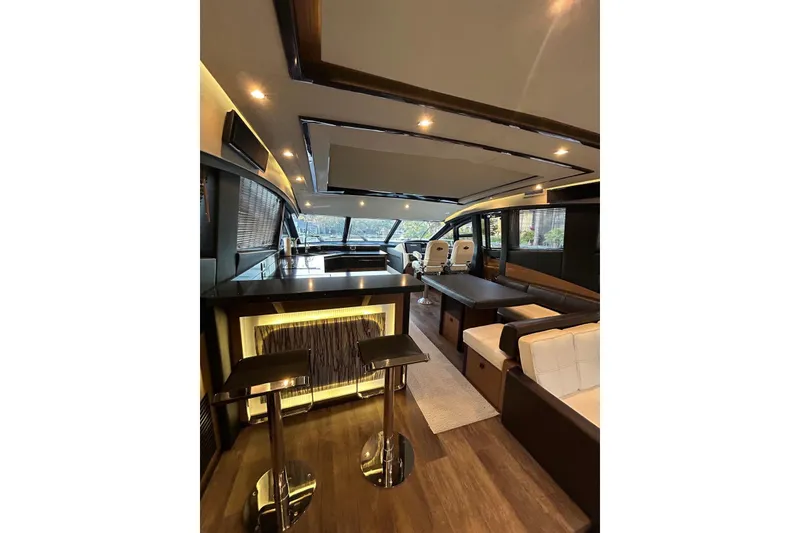 Slide: The Image of Luxurious interior of 2016 Sea Ray L650 yacht with modern seating and elegant lighting. - 17