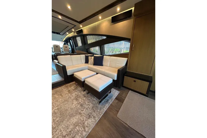 Slide: The Image of Luxurious interior of 2016 Sea Ray L650 yacht with elegant seating and modern design. - 19
