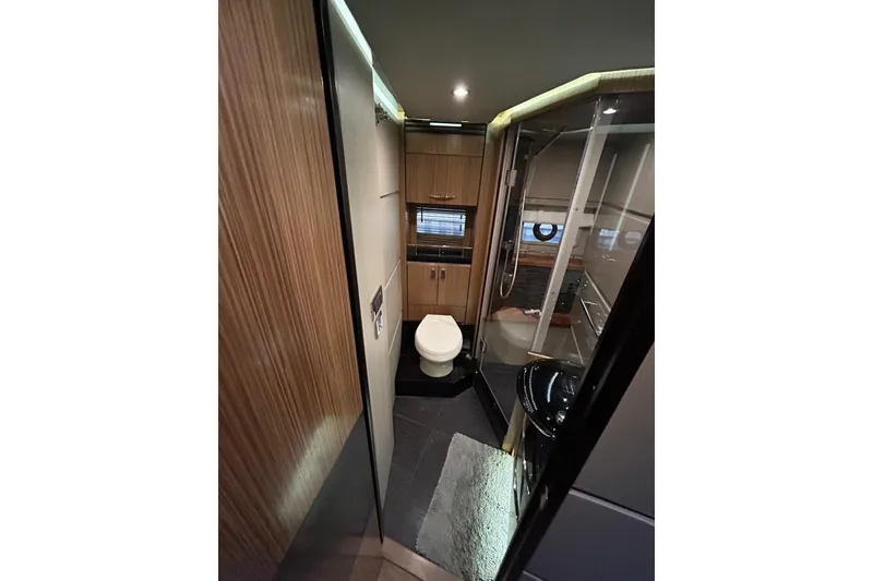 Slide: The Image of Luxurious bathroom interior of 2016 Sea Ray L650 yacht with modern amenities. - 32