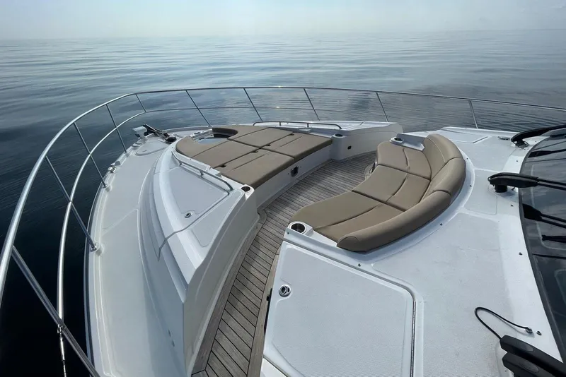 Slide: The Image of Luxurious 2016 Sea Ray L650 yacht with spacious deck and elegant seating. - 53