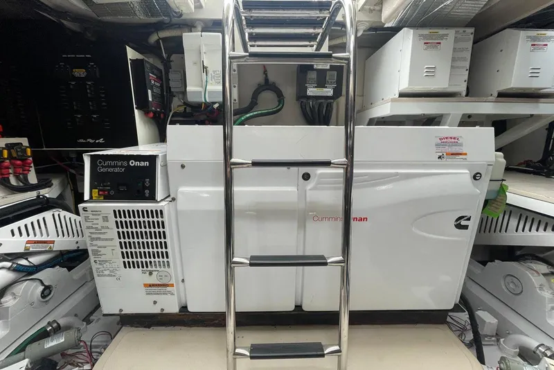 Slide: The Image of Engine room of 2016 Sea Ray L650 with Cummins Onan generator and equipment. - 65