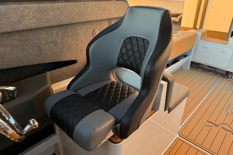 Slide: The Image of Luxurious seating in 2026 Makaira Gen3 26 Outboard boat, featuring quilted upholstery. - 20