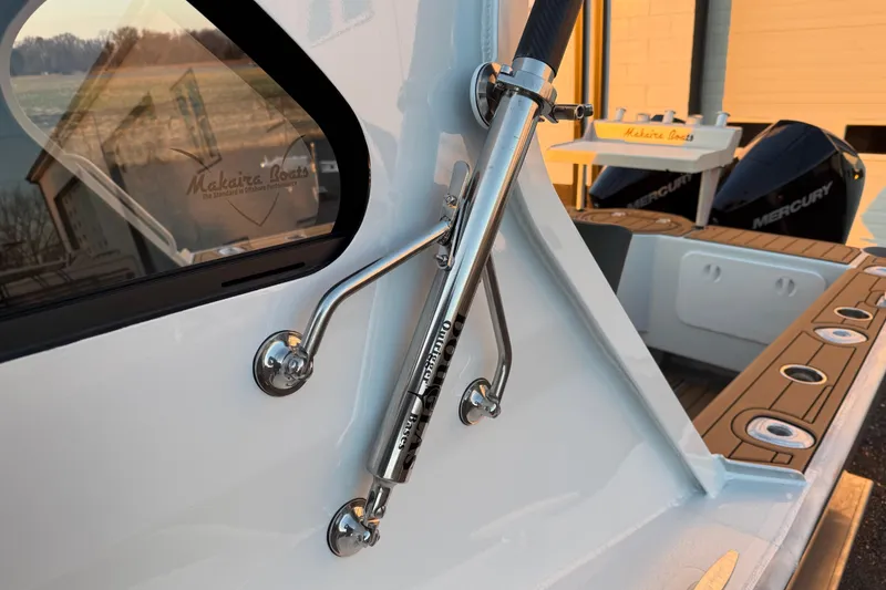 Slide: The Image of 2026 Makaira Gen3 26 Outboard boat with Mercury engines and sleek design details. - 43