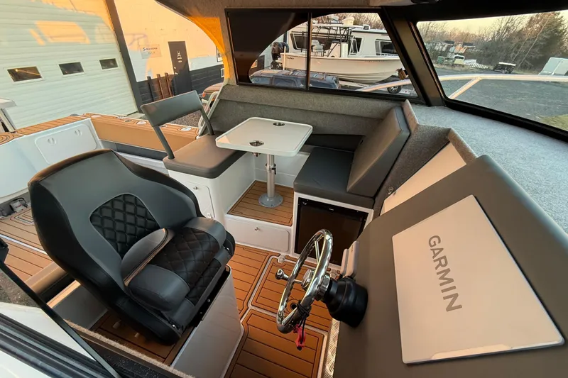 Slide: The Image of Interior of 2026 Makaira Gen3 26 Outboard boat with Garmin navigation system. - 7