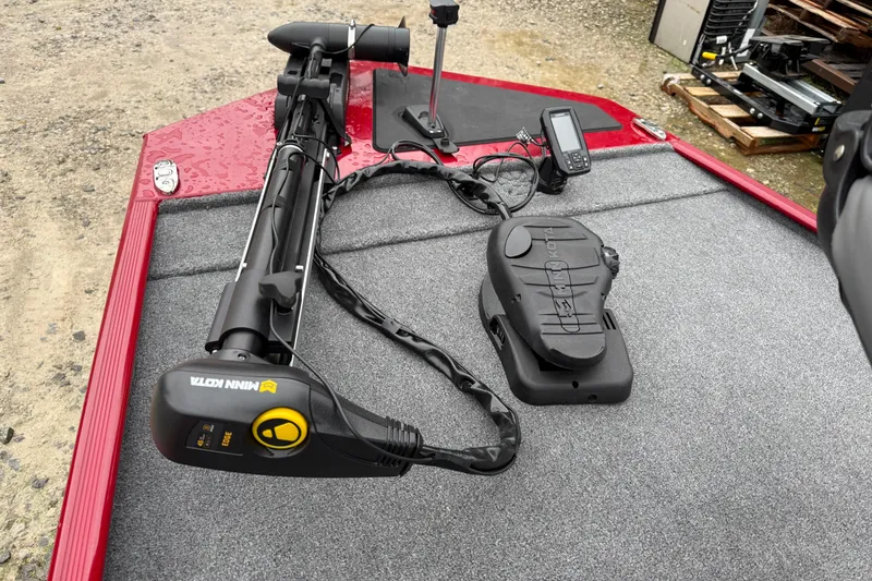 Slide: The Image of 2025 Tracker Bass Tracker Classic XL boat with Minn Kota trolling motor and fish finder. - 4