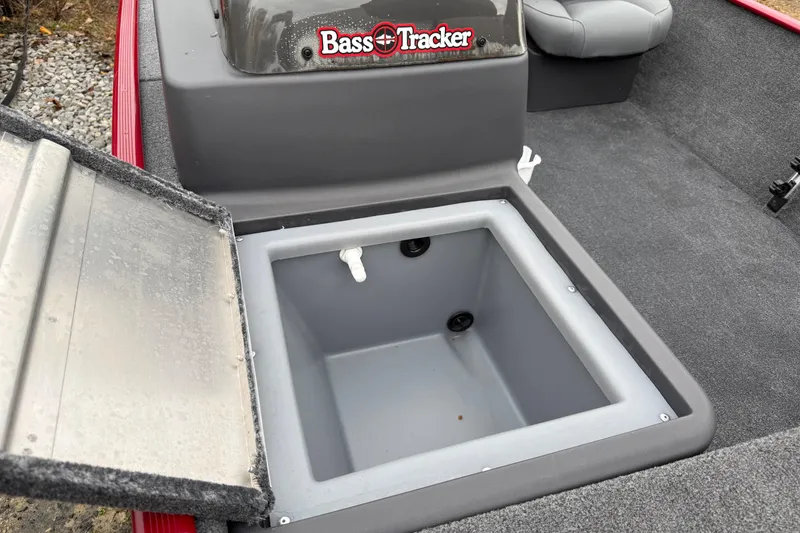 Slide: The Image of 2025 Tracker Bass Tracker Classic XL boat with open storage compartment. - 8