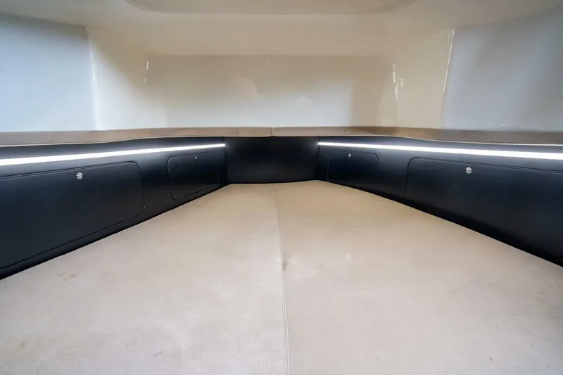 Slide: The Image of Interior cabin of 2023 Skipper-BSK 42 boat, featuring sleek design and ambient lighting. - 18