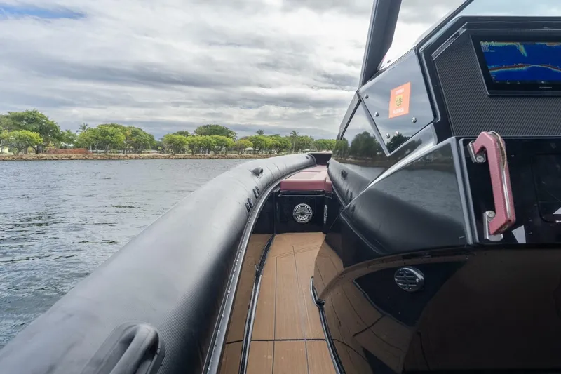 Slide: The Image of 2023 Skipper-BSK 42 boat on water, featuring sleek design and advanced navigation system. - 20