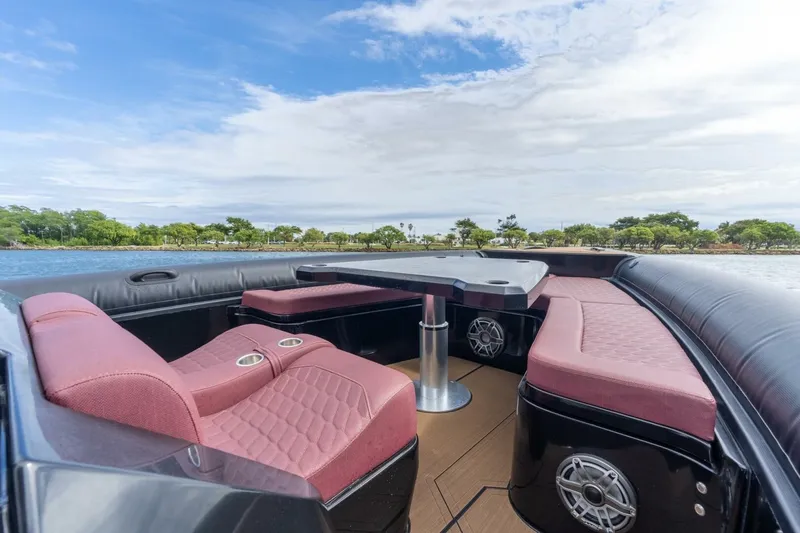 Slide: The Image of Luxurious 2023 Skipper-BSK 42 boat interior with plush seating and scenic water view. - 22