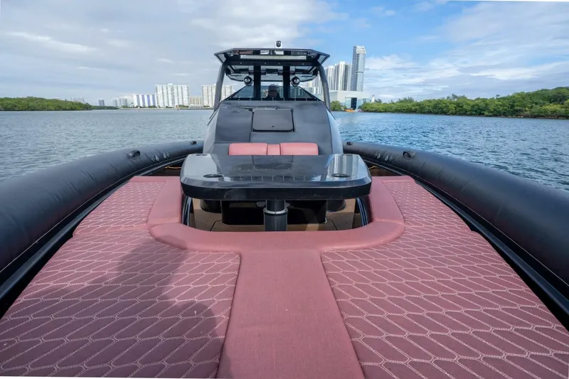 Slide: The Image of Luxury Skipper-BSK 42 boat, 2023 model, with sleek design and spacious deck on water. - 23