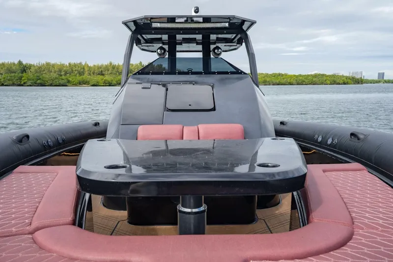 Slide: The Image of Luxury Skipper-BSK 42 boat interior with sleek design, 2023 model, on calm waters. - 24