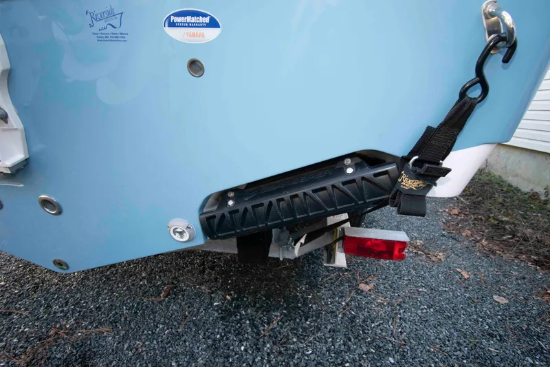 Slide: The Image of 2024 Sportsman Open 252 Center Console boat trailer hitch detail. - 20