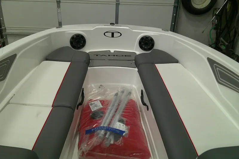 Slide: The Image of Interior of a 2025 Tahoe T21 boat with seating and accessories. - 10