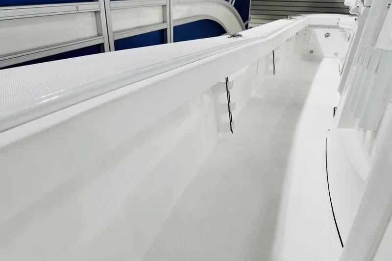 Slide: The Image of 2026 BlackJack 256 Coastal boat interior, showcasing sleek white design and spacious layout. - 11