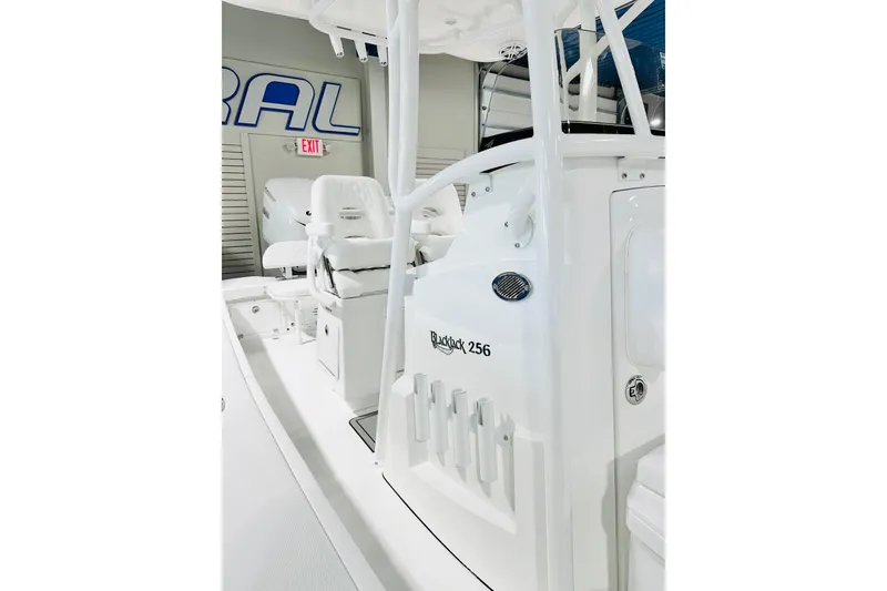 Slide: The Image of 2026 BlackJack 256 Coastal boat interior, showcasing sleek white design and seating arrangement. - 12