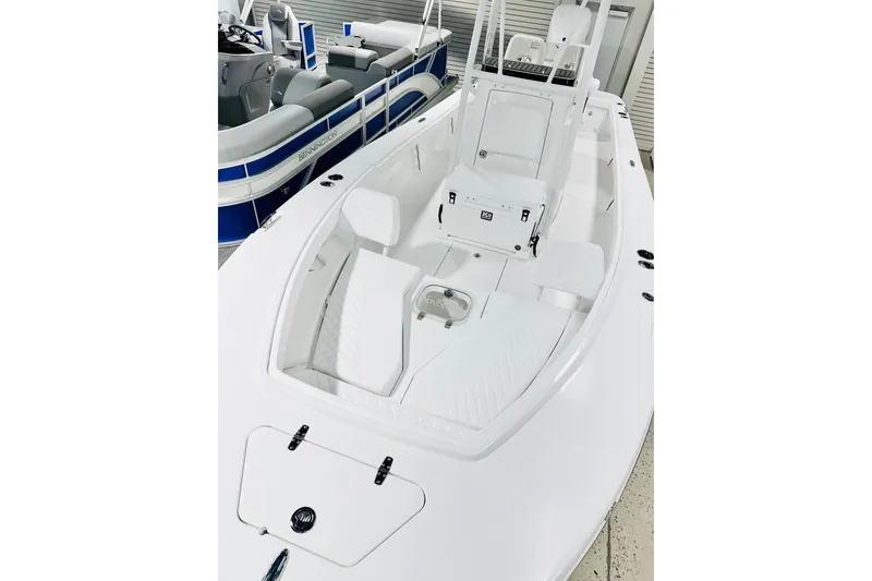 Slide: The Image of 2026 BlackJack 256 Coastal boat interior with white seating and sleek design. - 9