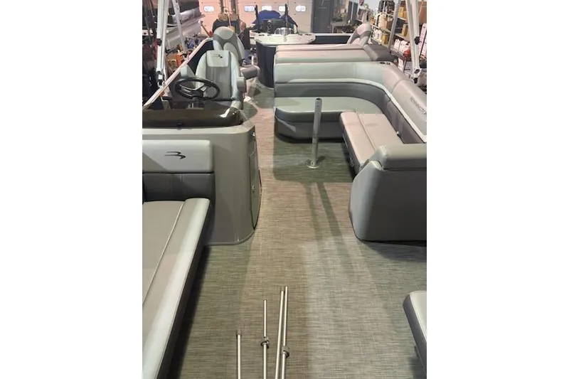 Slide: The Image of 2020 Bennington 21SSX pontoon boat interior with spacious seating and modern design. - 21
