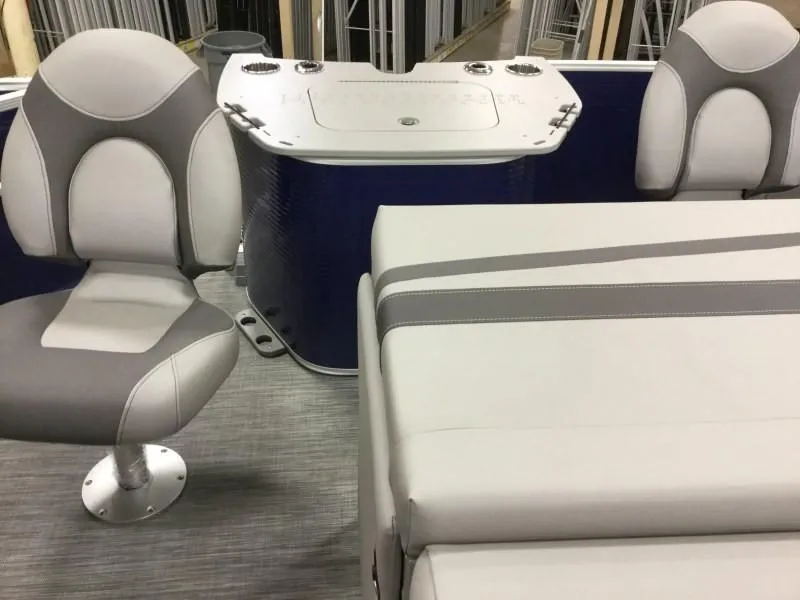 Slide: The Image of Interior of a 2020 Bennington 21SSX pontoon boat with gray seating. - 3