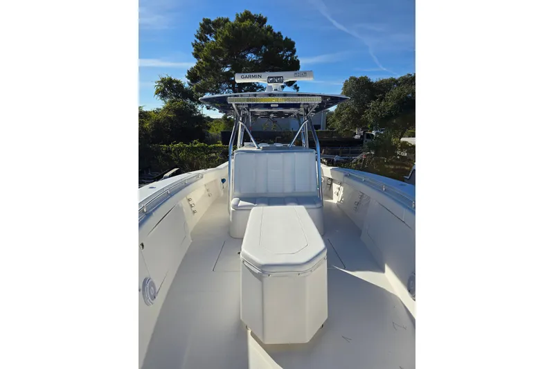 Slide: The Image of 2013 Invincible 42 Open Fisherman boat with spacious deck and seating. - 10