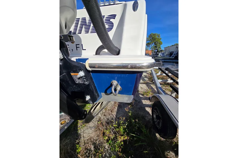 Slide: The Image of 2013 Invincible 42 Open Fisherman boat detail with trailer, parked outdoors. - 19